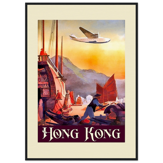 "A vintage-style Giclée art poster titled 'Hong Kong' featuring a bustling harbour scene with junks, a seaplane flying overhead, and a person loading cargo onto a boat. The poster has a warm colour palette with orange, yellow, and red hues, depicting a sunset or sunrise over the hills of Hong Kong. The text 'Hong Kong' is displayed in a classic font at the bottom of the poster."